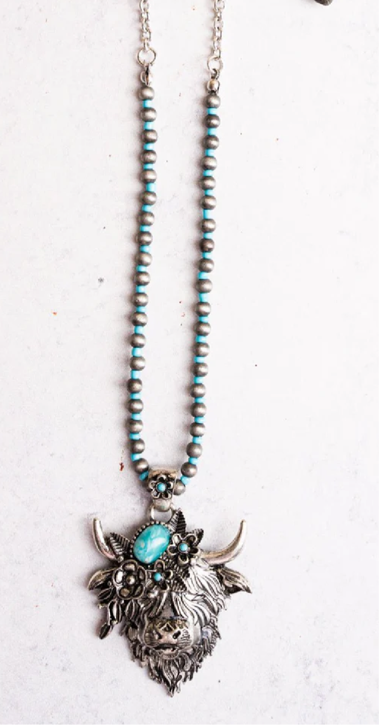 Turquoise moodonna cow silver necklace